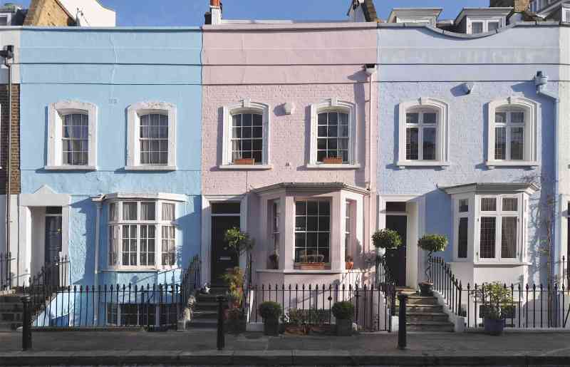 A row of colourful British terraced houses