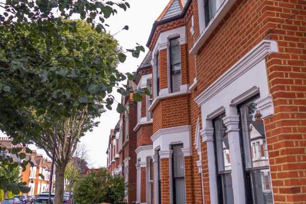 Traditional British terraced houses, pictured on a cloudy day